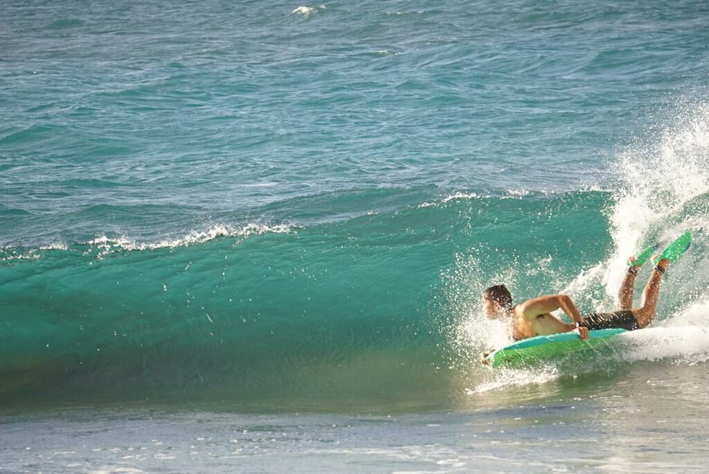 Catching a wave on a hot, sunny day